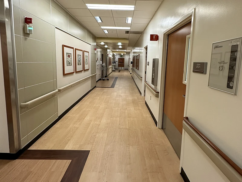 Renovated hospital corridor with handrails and wall protection at Torrance Memorial Medical Center